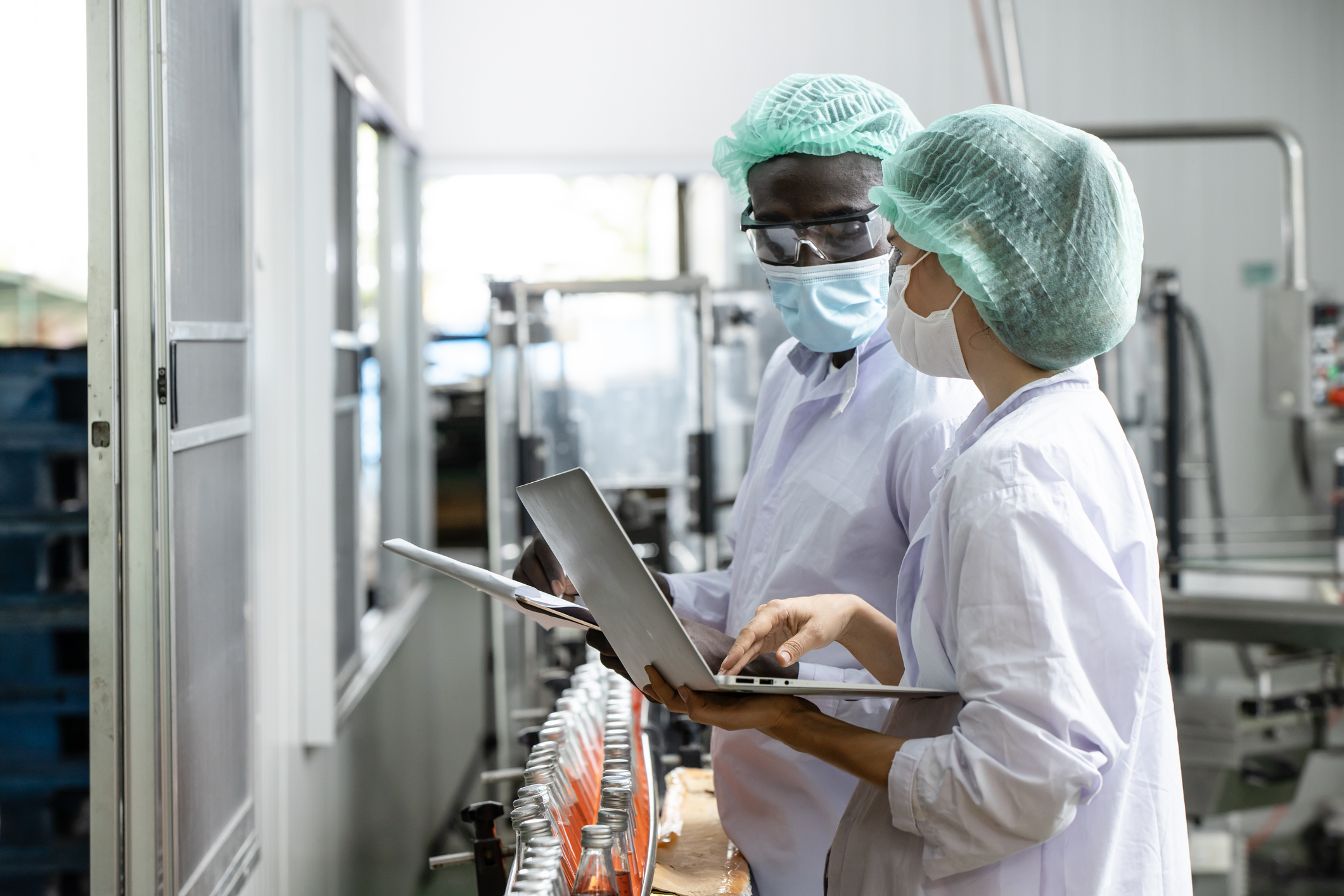 Drink beverage factory QC audit staff quality control worker team working. Hygiene officer clean standard check process inspection in plant production line.